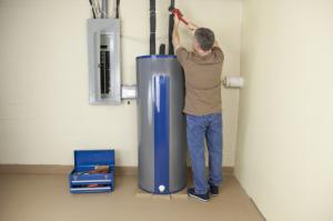 A Dayton Plumbing Contractor installs a water heater